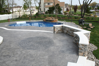 stamped concrete pool patio