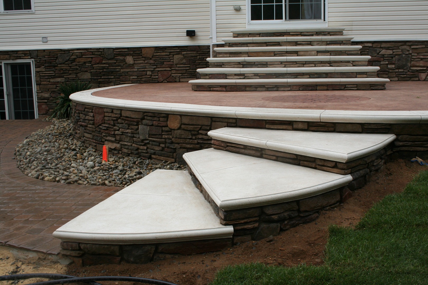 patio and steps, stamped concrete, white concrete bullnose