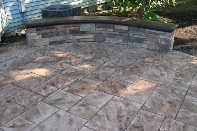 seating wall on stemped concrete patio